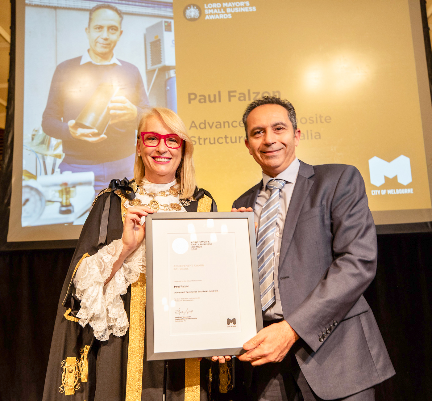 Paul Falzon receiving City of Melbourne Lord Mayor Business Award from Sally Capp - August 2023