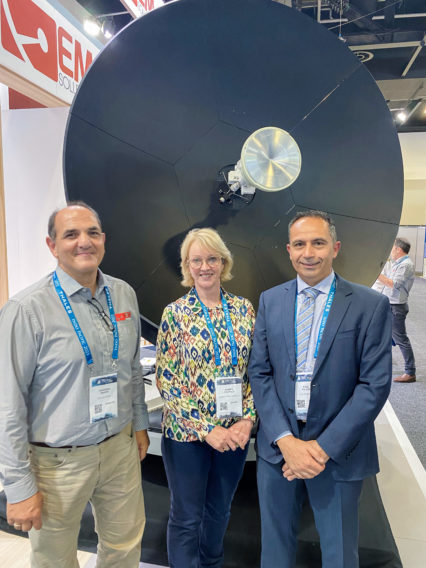 Kerryn Caulfield (Composites Australia), George Makris (EM Solutions) and Paul Falzon (ACS Australia in front of the King Cobra SatCom System at Indo Pacific Expo 2023