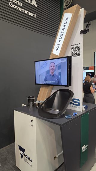Advanced Composite Structures Australia | ACS-A stand at the Victoria Stand with demonstrators, including UHT composite rocket nozzle, scale model of UAV Seaflight drone and GhostShark part
